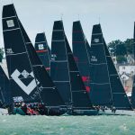 TP52s and other IRC Class Zero yachts crossing the start line together for the Britannia Cup at North Sails Cowes Week