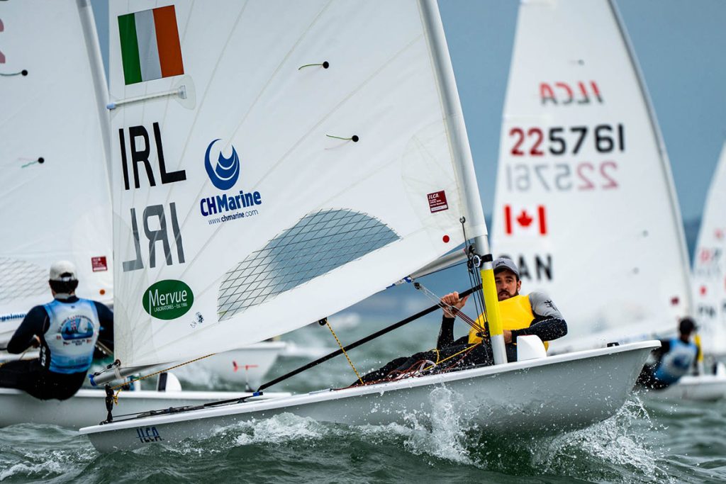 ILCA 7 sailors racing upwind at the 2026 World Championships in Dublin Bay